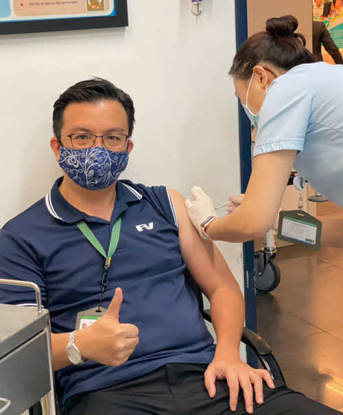 Dr Do Trong Khanh, Medical Director of FV Hospital, receives his Covid-19 vaccine