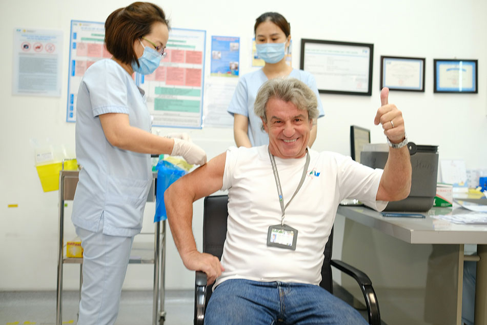 Dr Jean-Marcel Guillion, CEO of FV Hospital, receives his Covid-19 vaccine 